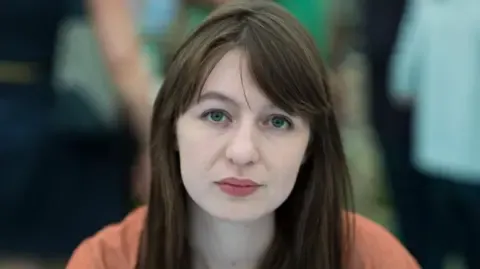 Sally Rooney claims she cannot enter the UK because of arrest fears
