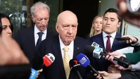 Indecent Assault Accusations Against Top Australian Broadcaster Downgraded
